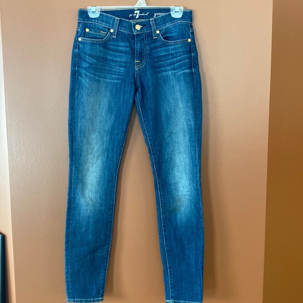 7 for all mankind ladies jeans in size 25 with fading and whiskering.